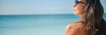 A young woman on a sunny beach